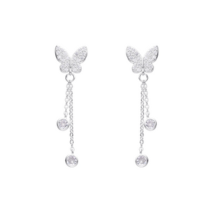 Aretes de mariposa y puntos de luz