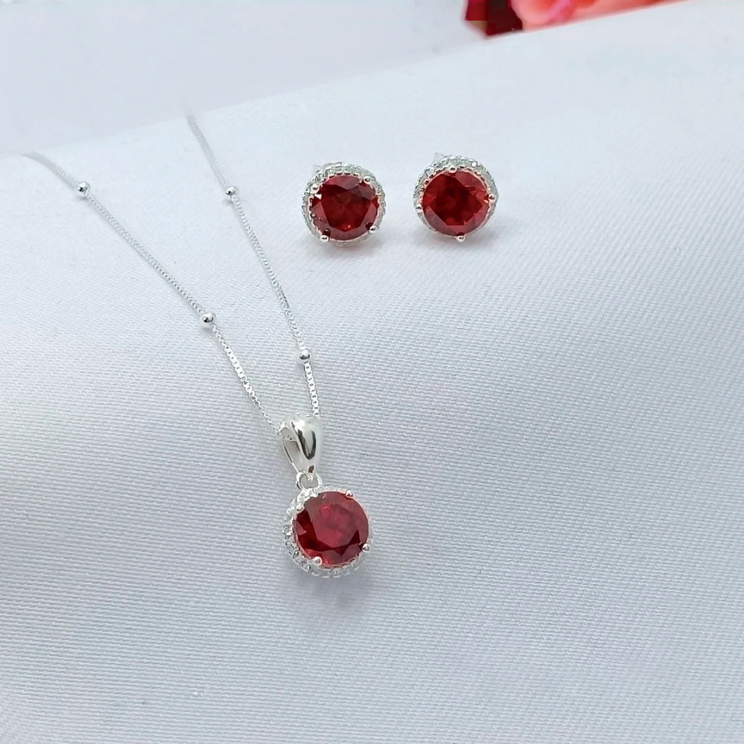 Conjunto de aretes y dije de plata