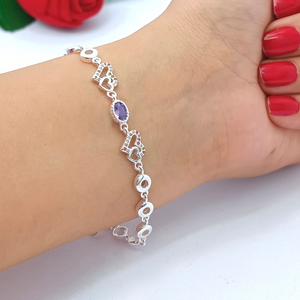 Manilla de plata con corazones